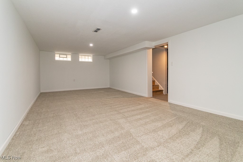 32609 Knobel Road Willowick, OH 44095 - Photo 21 of 29 Huge family room with new carpeting and lighting