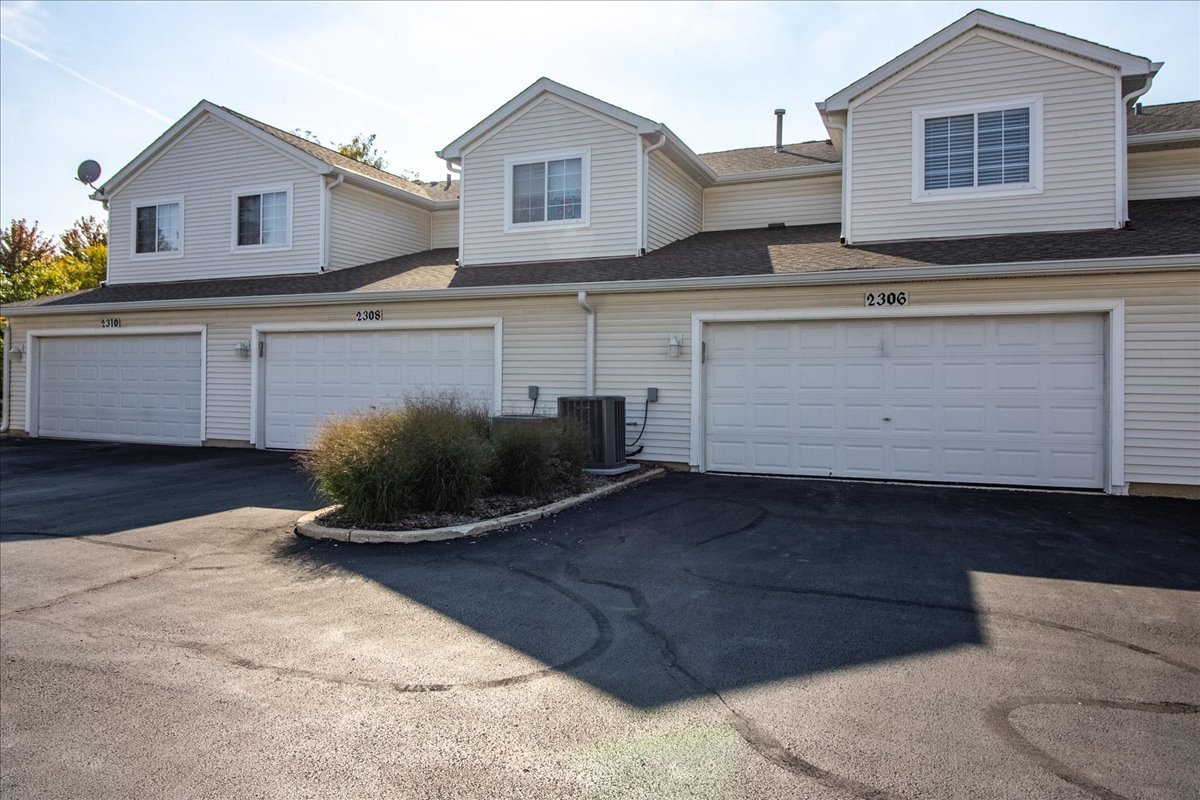2306 Reflections Drive Aurora, IL 60502 - Photo 6 of 6 a view of outdoor space and yard