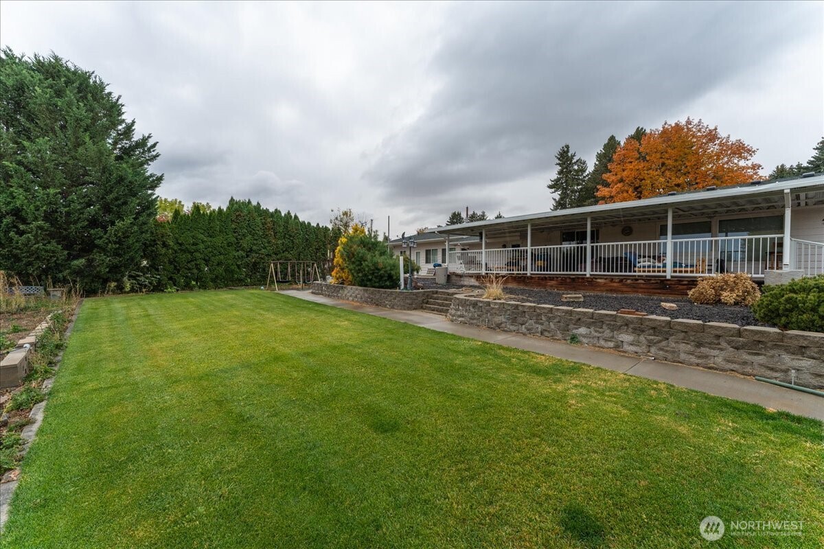 20271 Linden Road Northwest Soap Lake, WA 98851 - Photo 12 of 22 a view of a backyard with a garden and plants