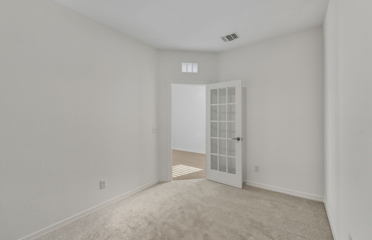 472 Tailwind Drive Kyle, TX 78640 - Photo 15 of 22 a view of an empty room