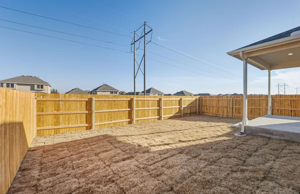 a view of a backyard of a house