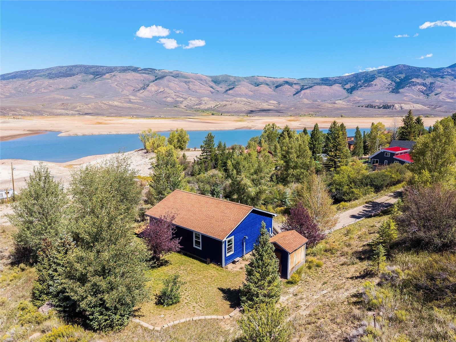 11 Blue Ridge Street Heeney, CO 80498 - Photo 1 of 45 Situated on nearly 1 acre, the property is one of the largest lots in town and borders Heeney Marina and Green Mountain Reservoir - Summit County’s only boatable waters for high-speed motorized craft and tow spots.