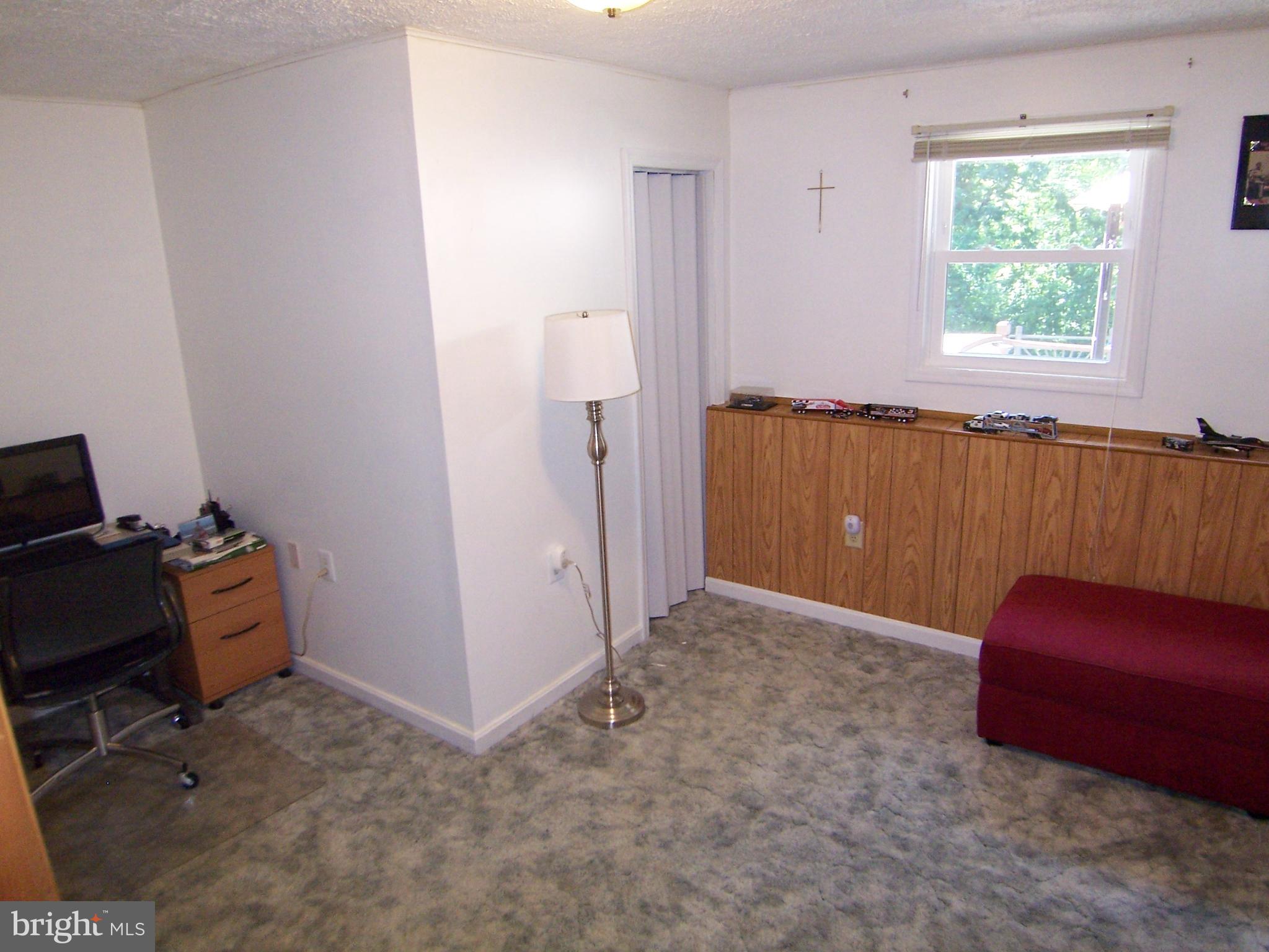 18 Yew Road Baltimore, MD 21221 - Photo 14 of 30 a view of workspace with furniture and a window