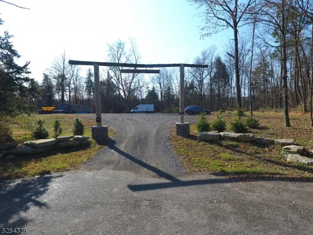 a view of a backyard with water fountain