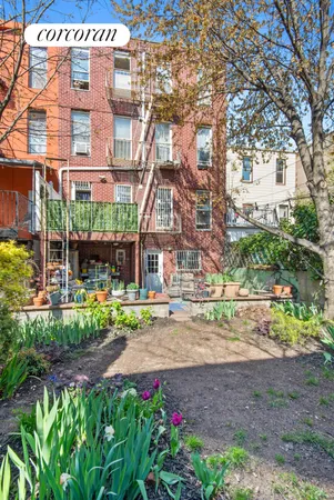 a front view of a building with brick walls