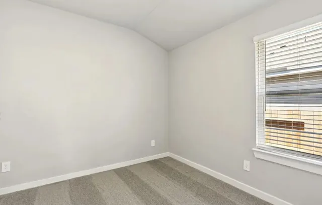 a view of a small space with window in it