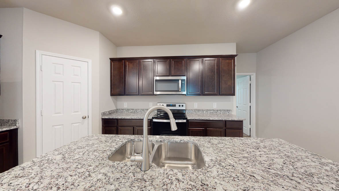 561 Hector Loop Georgetown, TX 78626 - Photo 4 of 30 a spacious bathroom with a tub and a sink