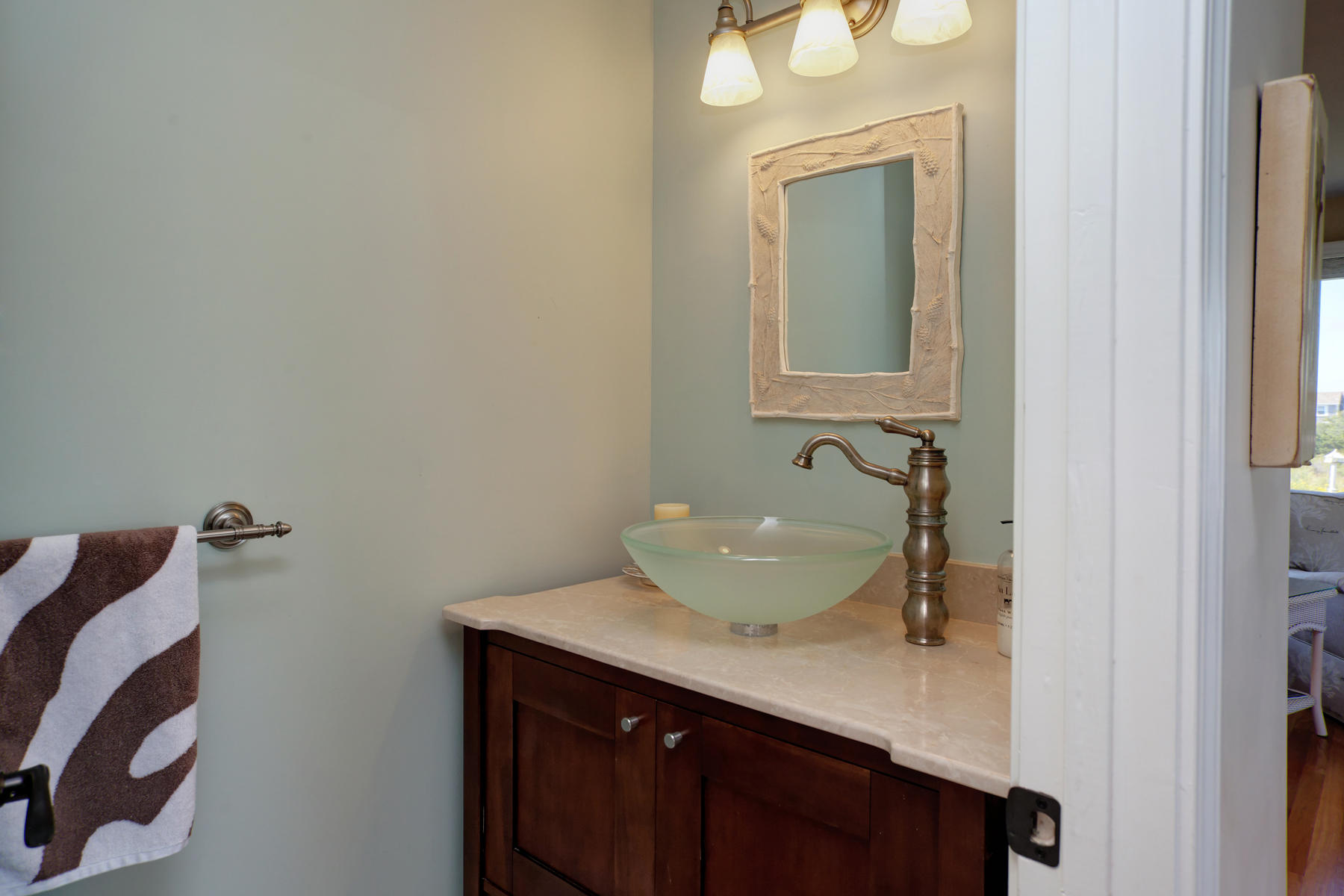 62 Long Beach Road Centerville, MA 02632 - Photo 13 of 27 a bathroom with a sink vanity and a mirror