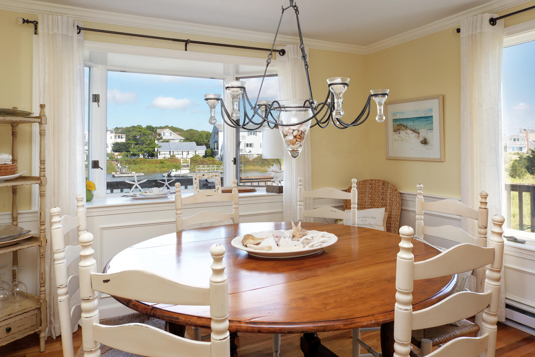 62 Long Beach Road Centerville, MA 02632 - Photo 14 of 27 a view of a dining room and livingroom