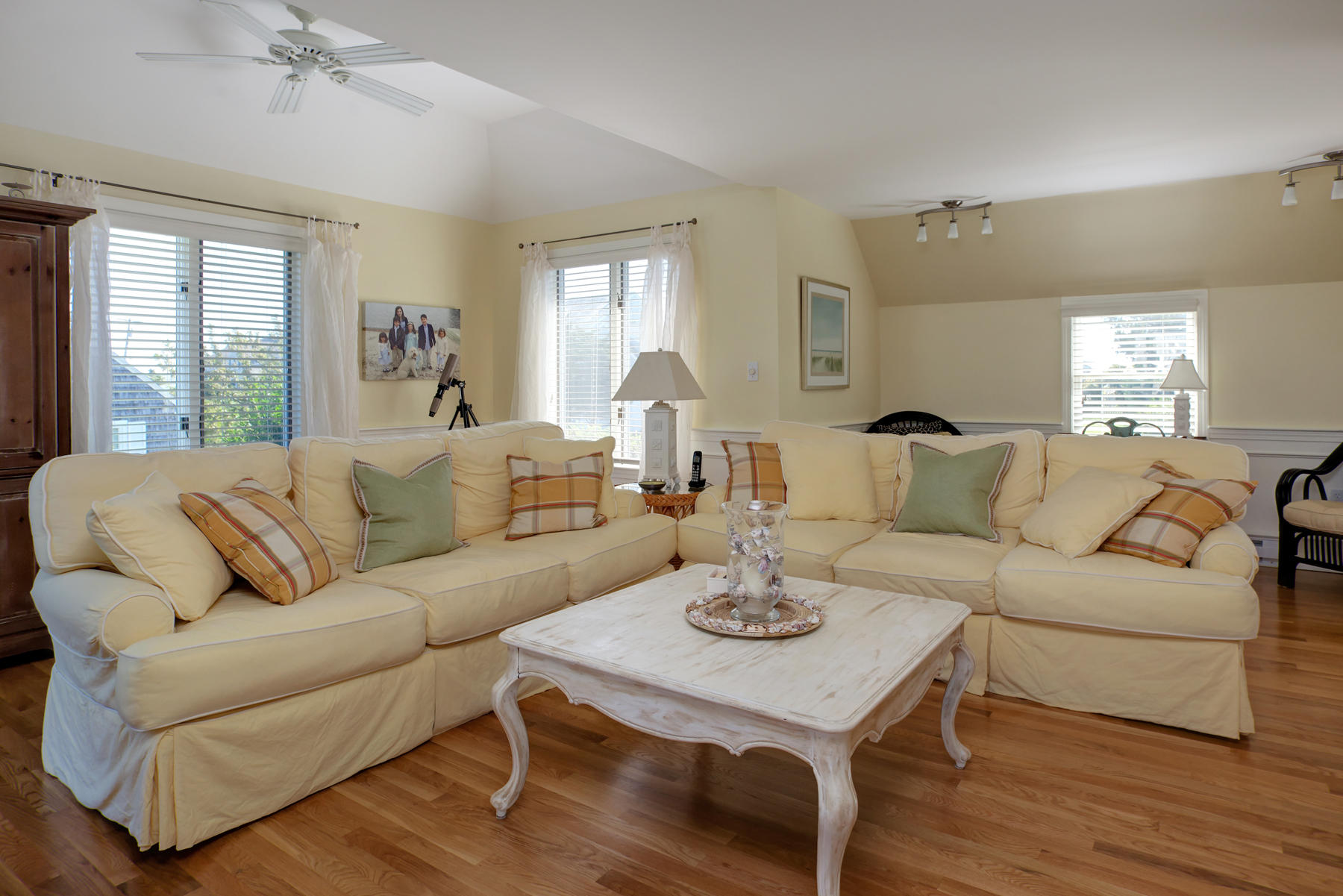 62 Long Beach Road Centerville, MA 02632 - Photo 16 of 27 a living room with furniture kitchen view and a table