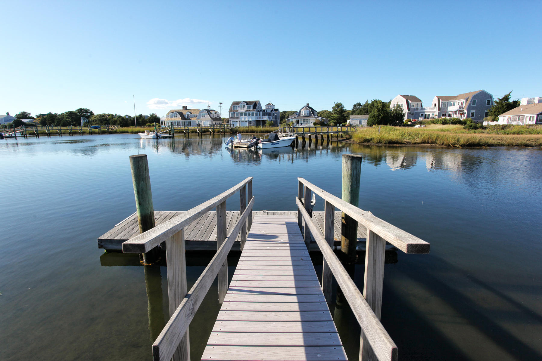 62 Long Beach Road Centerville, MA 02632 - Photo 2 of 27 a view of a lake with houses