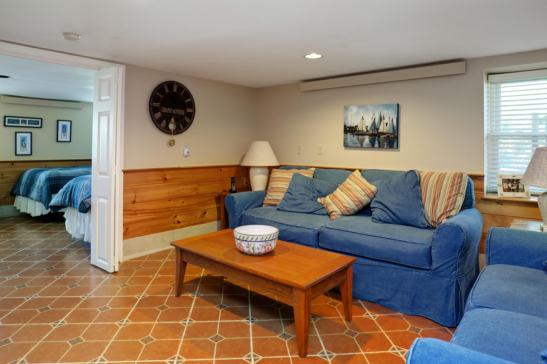 62 Long Beach Road Centerville, MA 02632 - Photo 22 of 27 a living room with furniture and a flat screen tv