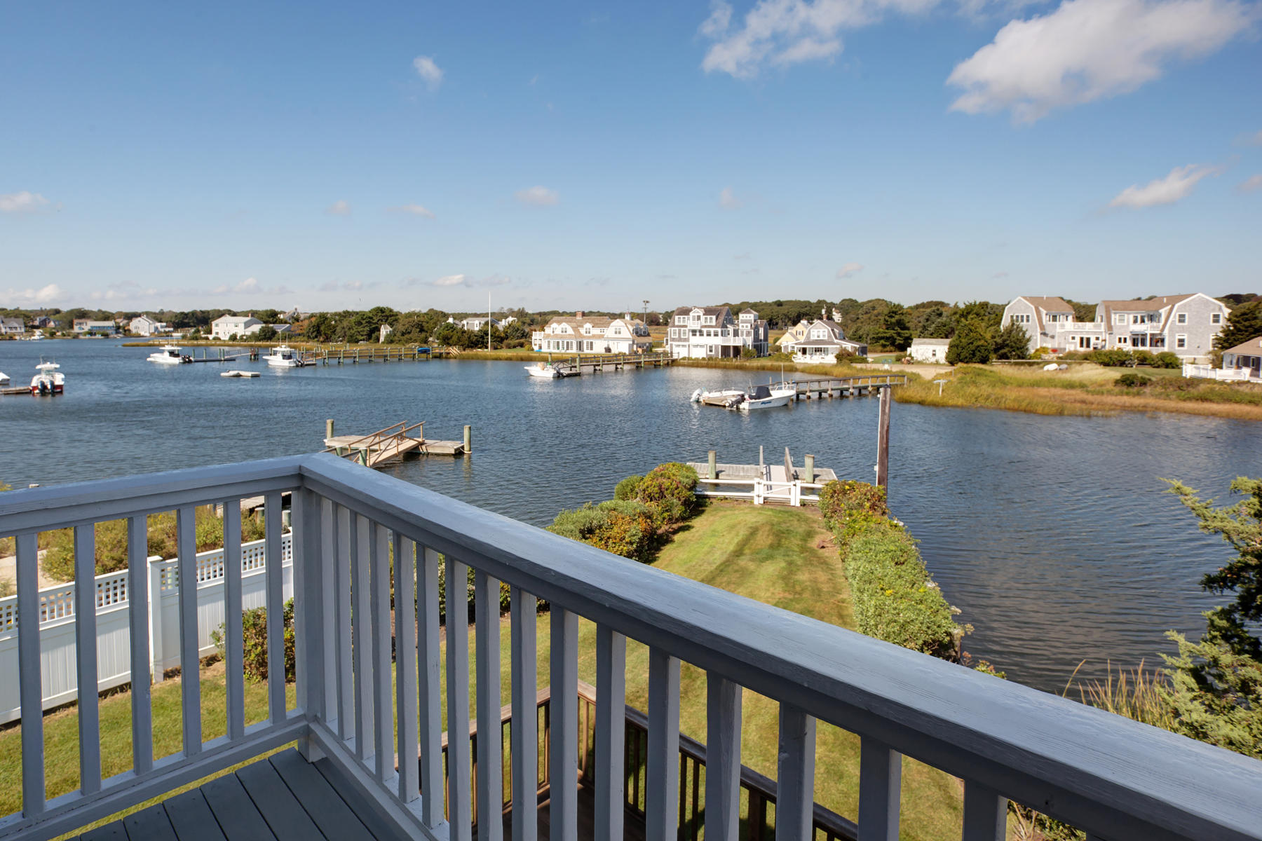 62 Long Beach Road Centerville, MA 02632 - Photo 3 of 27 a view of a lake with houses