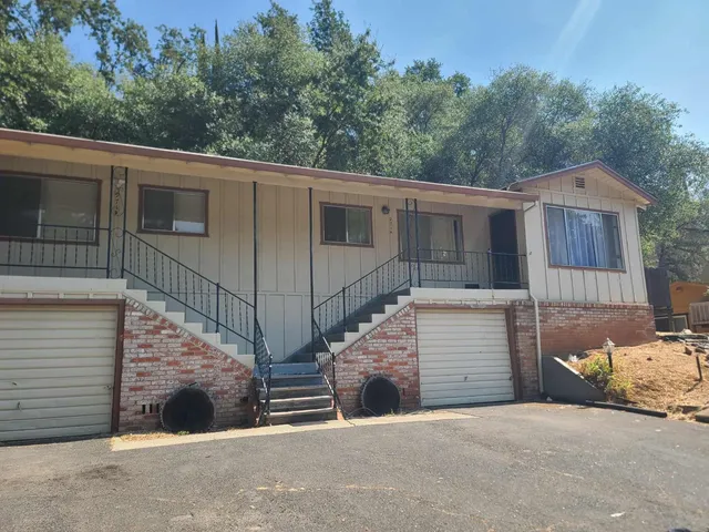 a view of a house with a garage