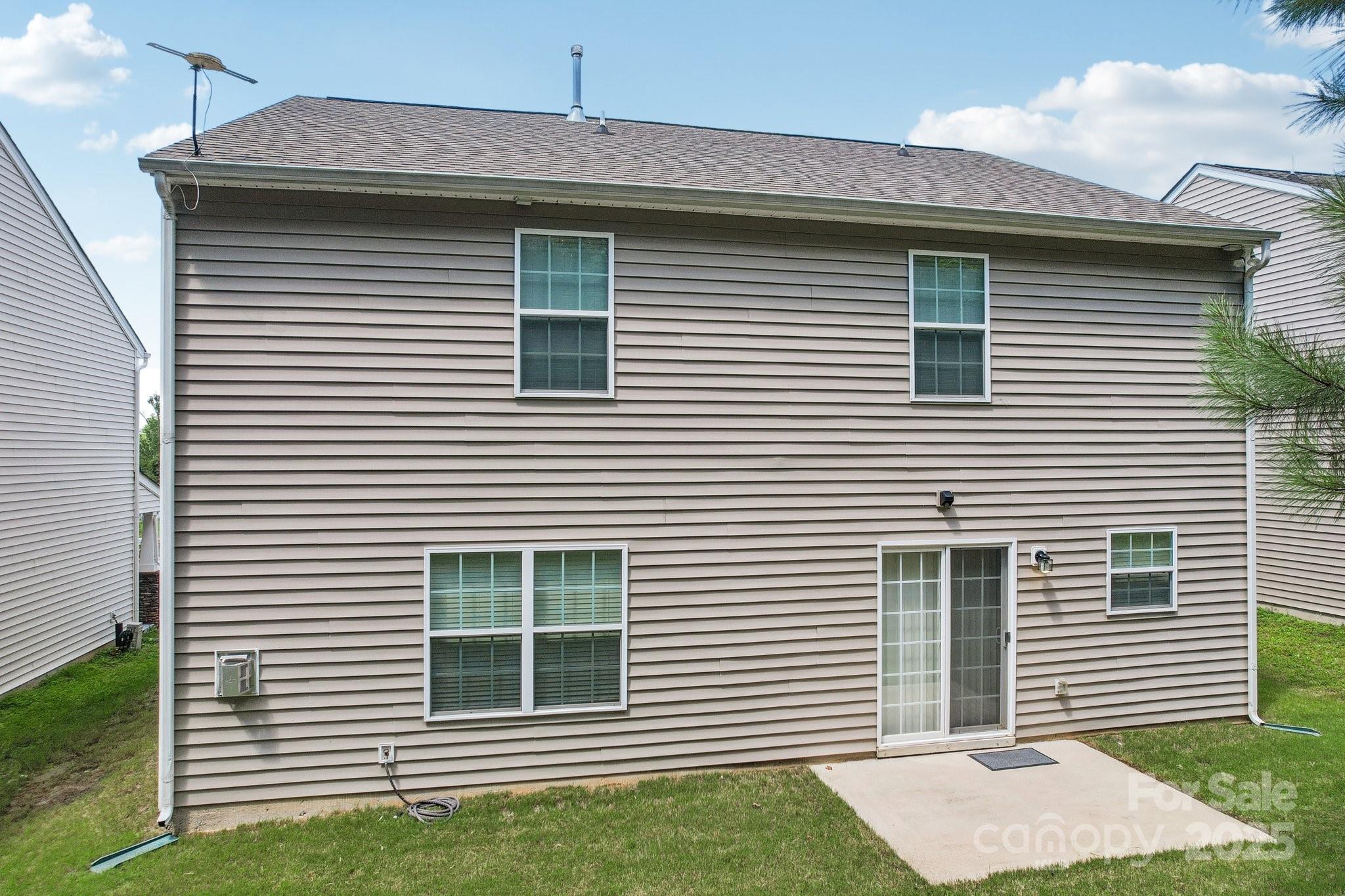 2289 Reid Pointe Avenue Indian Land, SC 29707 - Photo 33 of 39 a front view of a house with a yard and garage