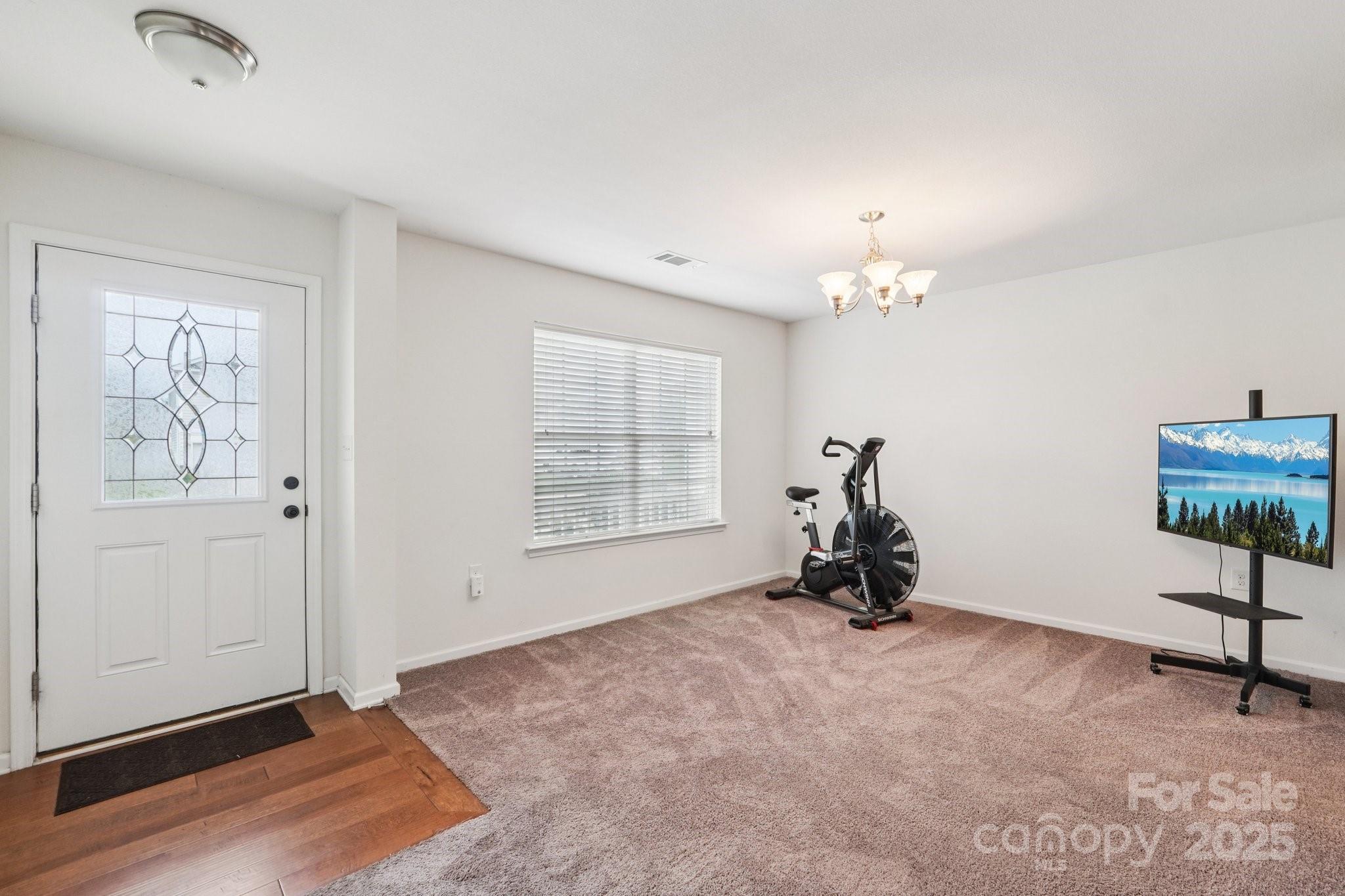 2289 Reid Pointe Avenue Indian Land, SC 29707 - Photo 5 of 39 an empty room with windows and closet