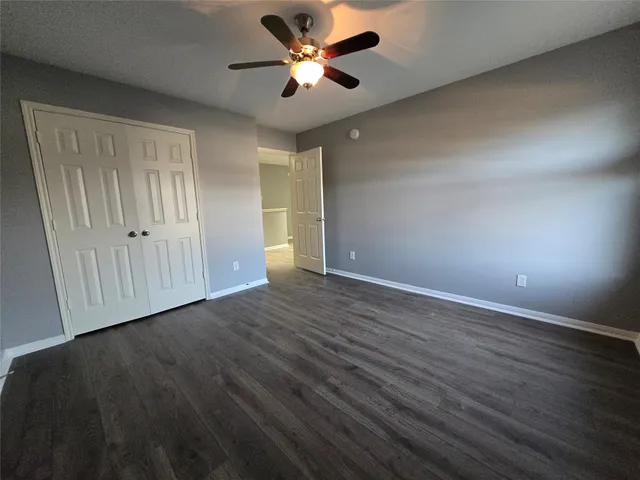 a view of an empty walk in closet