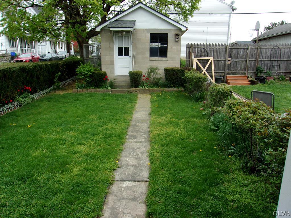 652 Spring Street Bethlehem, PA 18018 - Photo 5 of 26 a front view of a house with garden