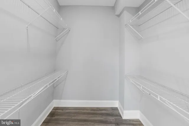 a view of an empty walk in closet
