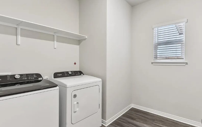 163 Pendleton Drive Kyle, TX 78640 - Photo 15 of 15 a utility room with dryer and washer