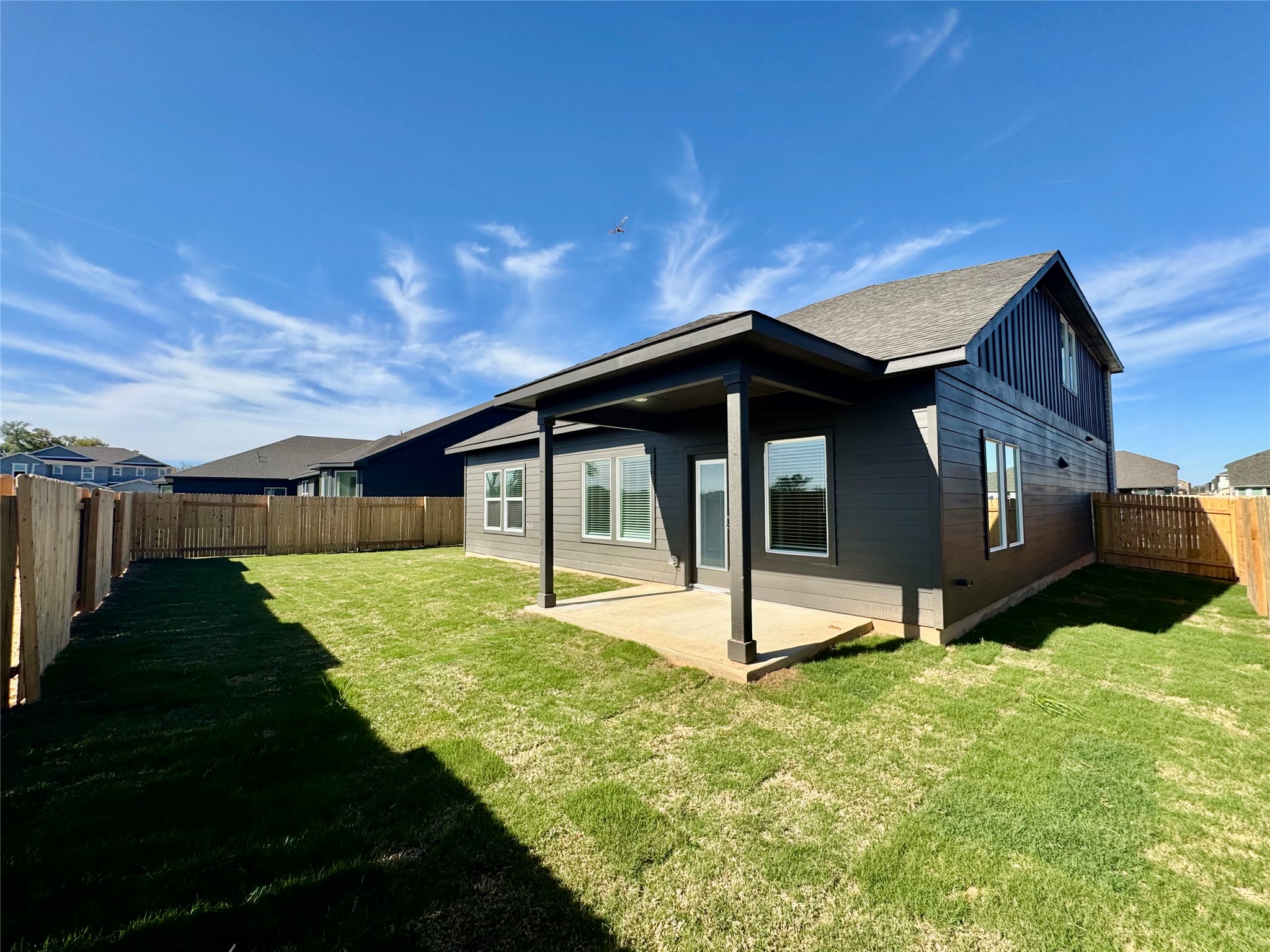 163 Pendleton Drive Kyle, TX 78640 - Photo 5 of 15 a house with green field in front of it