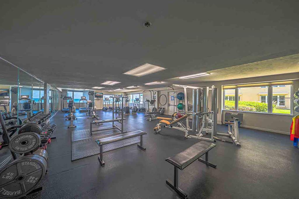 4575 South Atlantic Avenue, Unit 6209 Ponce Inlet, FL 32127 - Photo 29 of 31 a view of a room with gym equipment