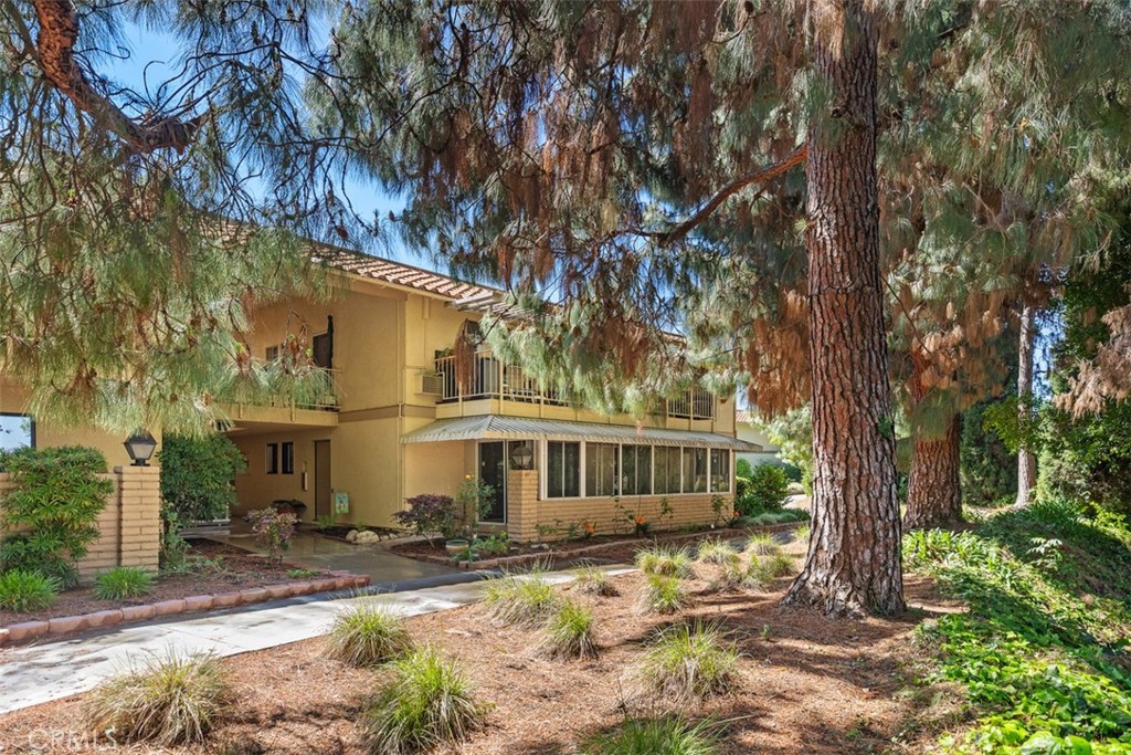 Welcome home to this beautiful tree filled location close to Aliso Creek.