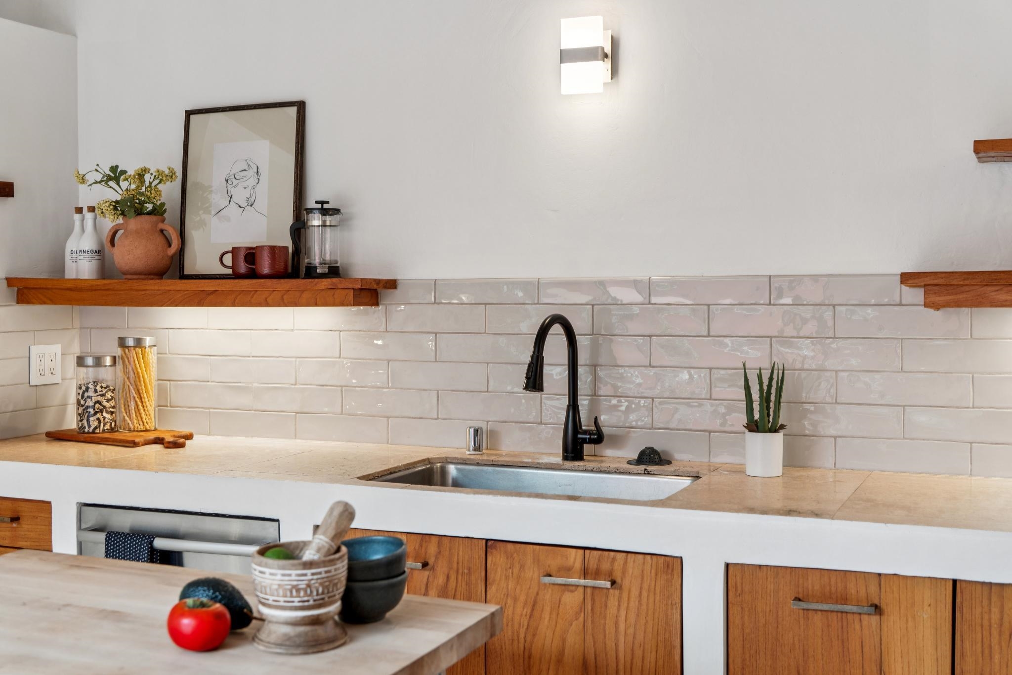 2015 Delaware Street, Unit A Berkeley, CA 94709 - Photo 12 of 59 Kitchen featuring open shelves and wood finish cabinets