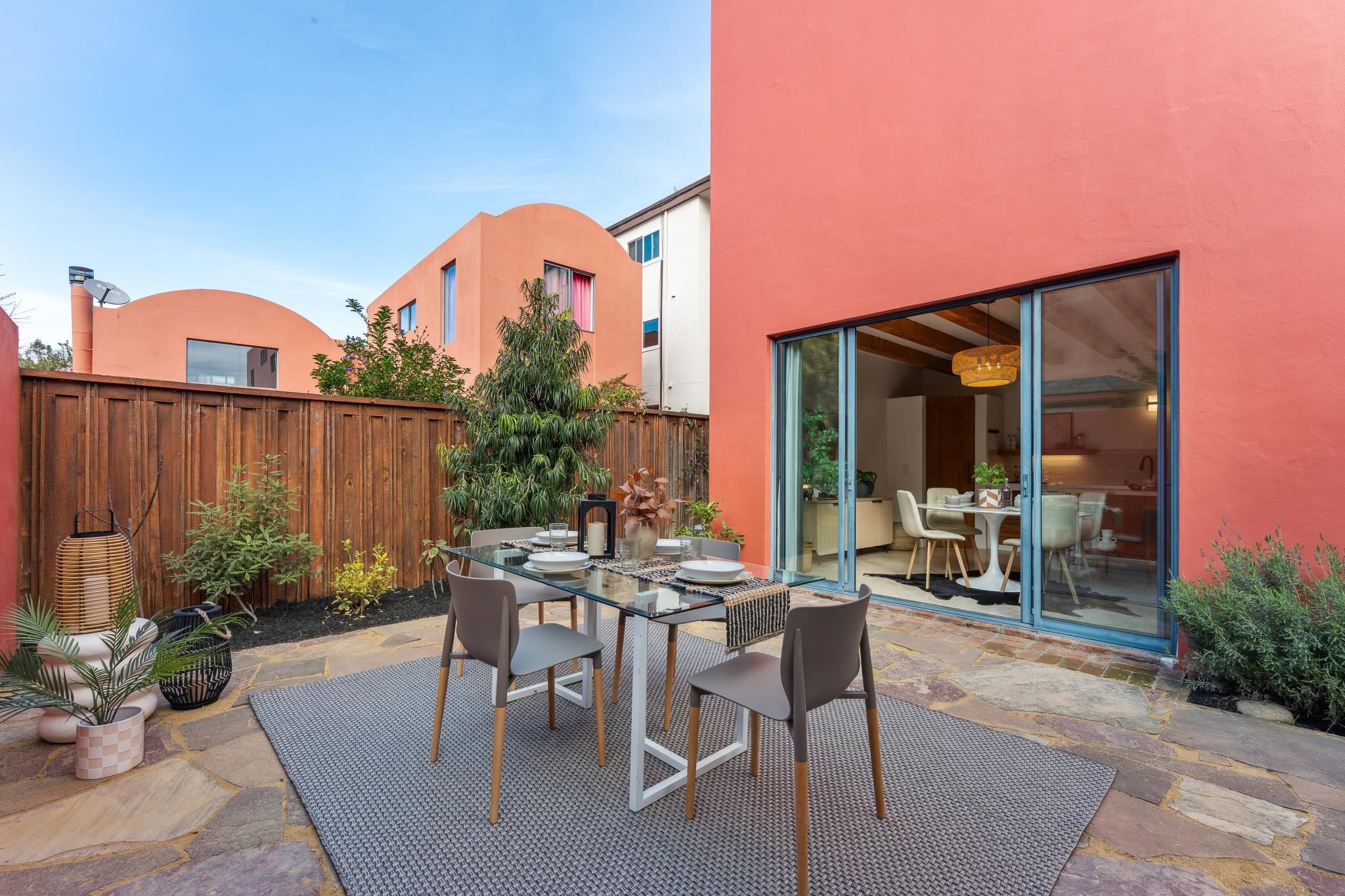 2015 Delaware Street, Unit A Berkeley, CA 94709 - Photo 22 of 59 Fenced backyard featuring outdoor dining space and a patio