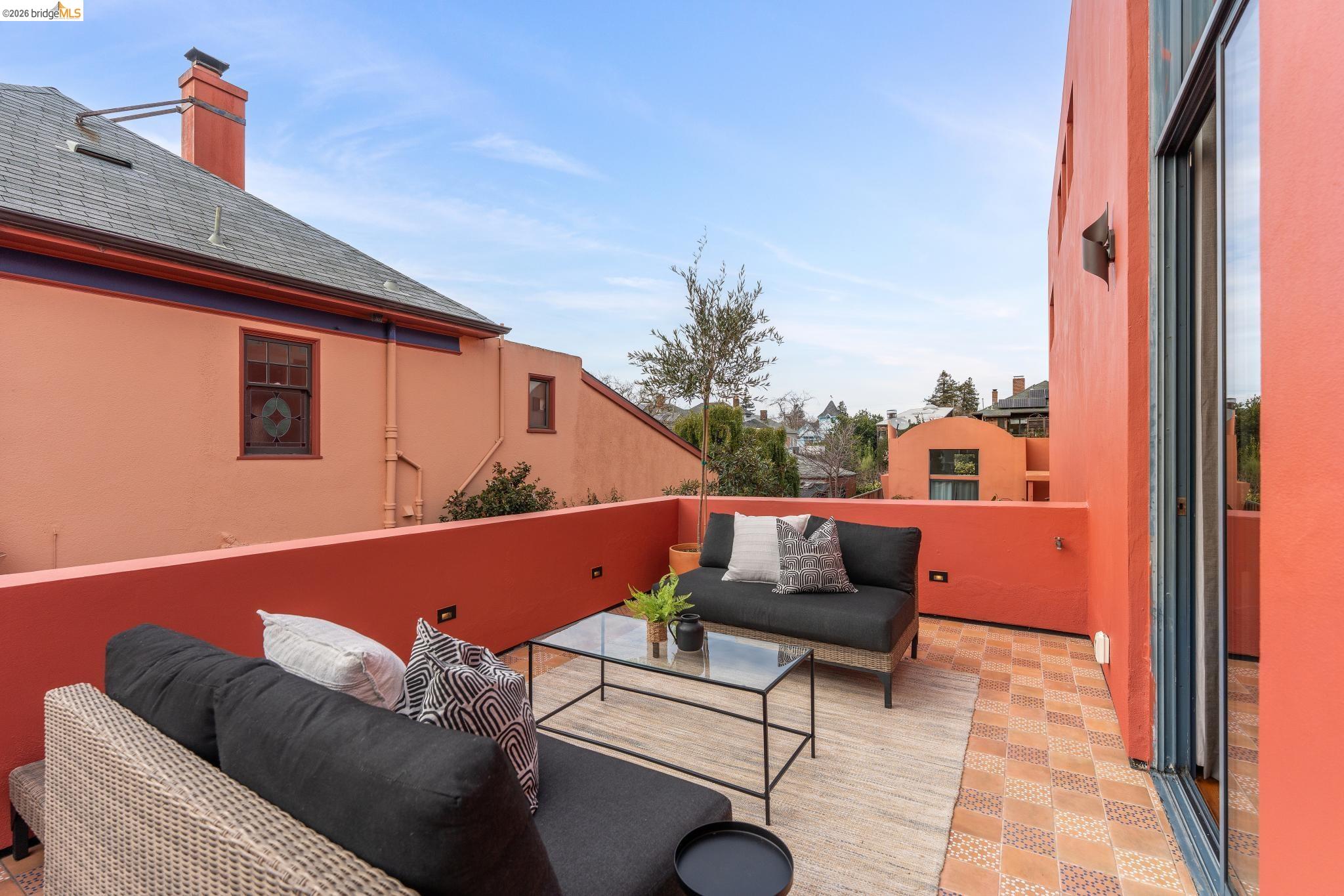 2015 Delaware Street, Unit A Berkeley, CA 94709 - Photo 33 of 60 a outdoor living space with furniture and city view