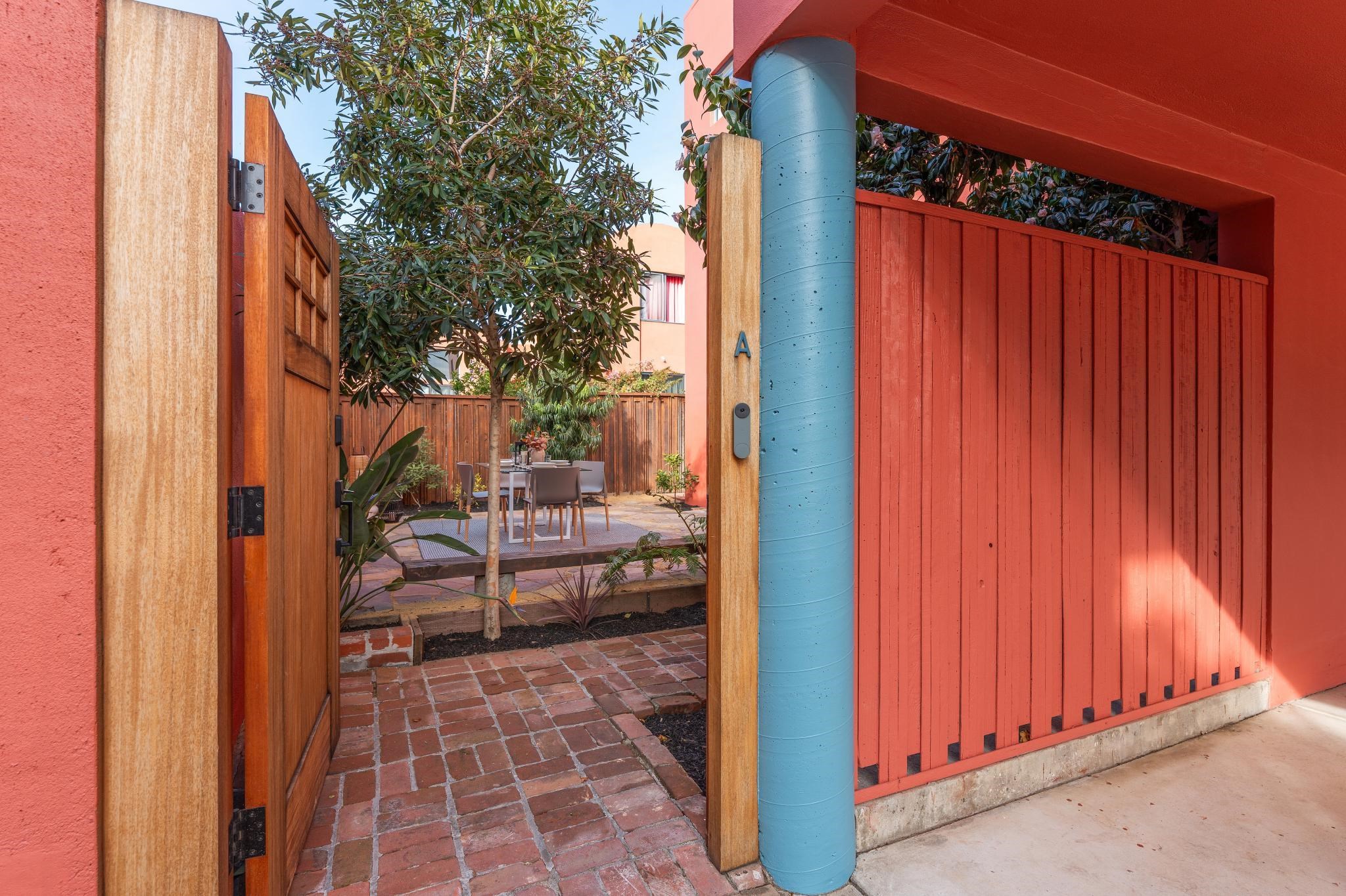 2015 Delaware Street, Unit A Berkeley, CA 94709 - Photo 4 of 59 Fenced backyard with a patio and outdoor dining space