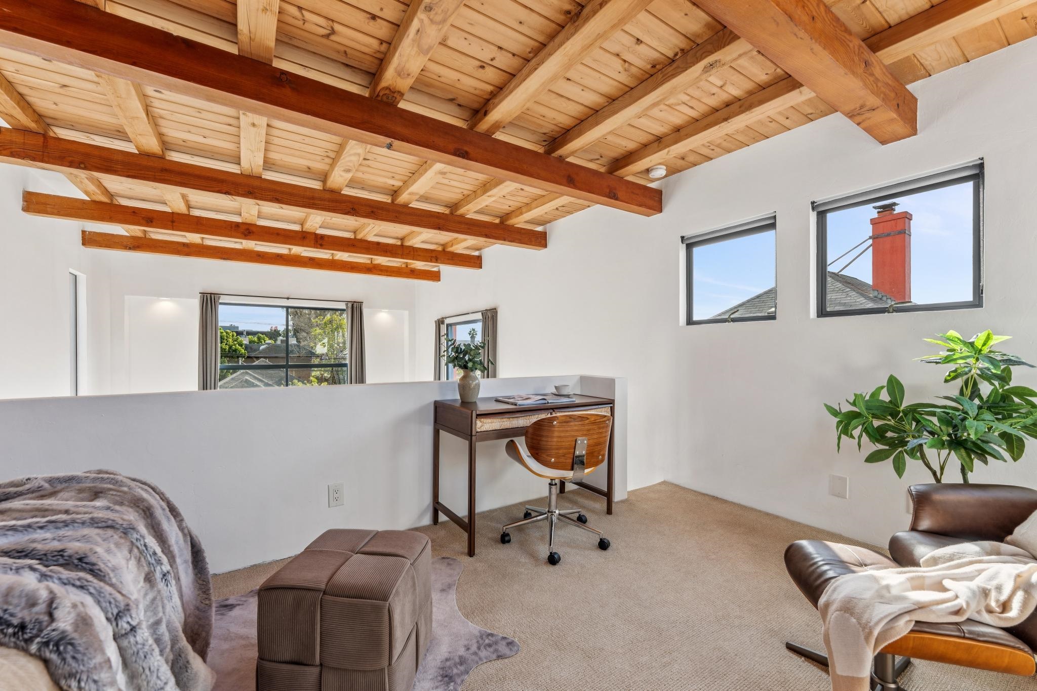 2015 Delaware Street, Unit A Berkeley, CA 94709 - Photo 46 of 59 Office area featuring carpet flooring, healthy amount of natural light, and a wooden ceiling with exposed beams