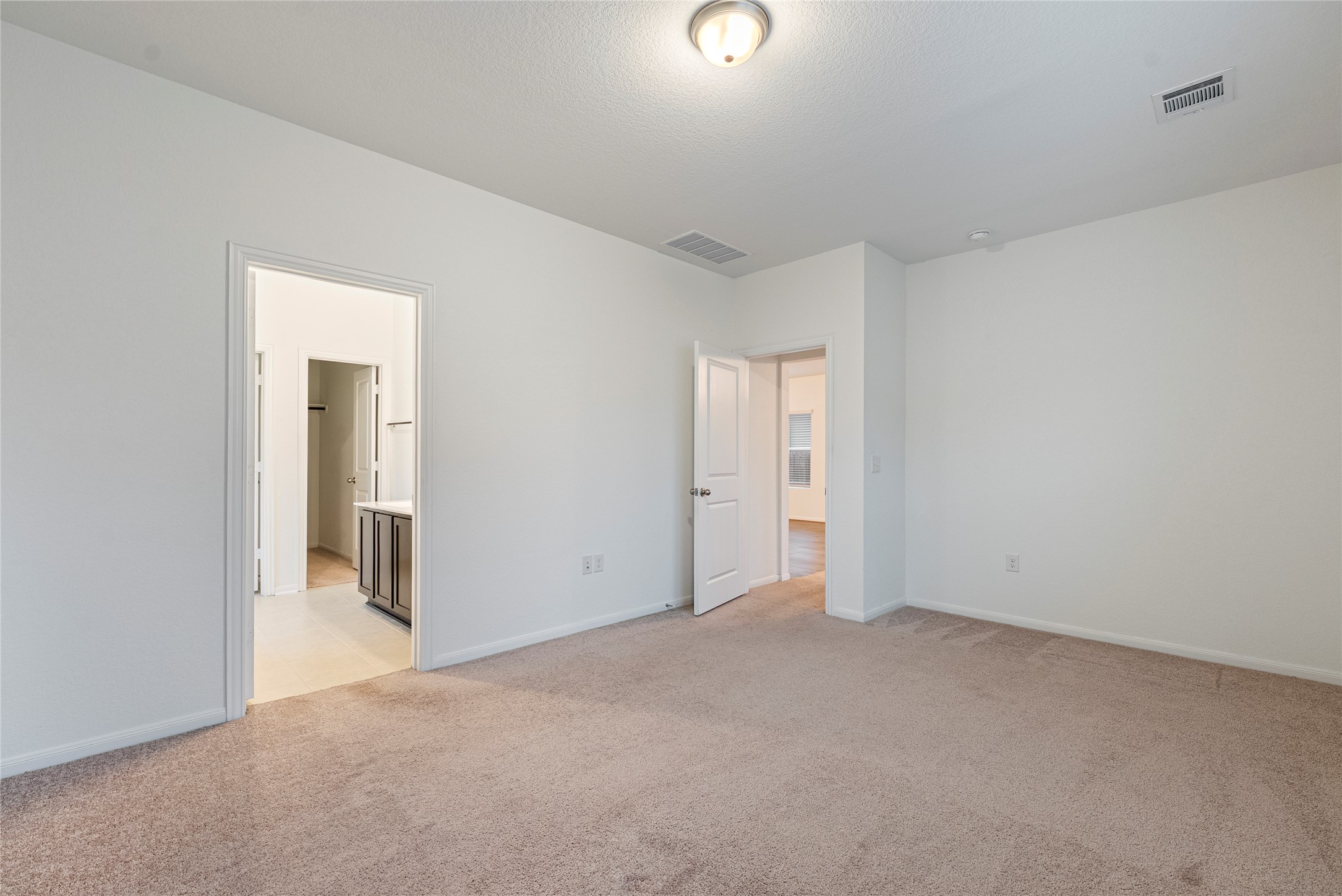 149 Biscayne Drive Kyle, TX 78640 - Photo 8 of 20 a view of an empty room and closet