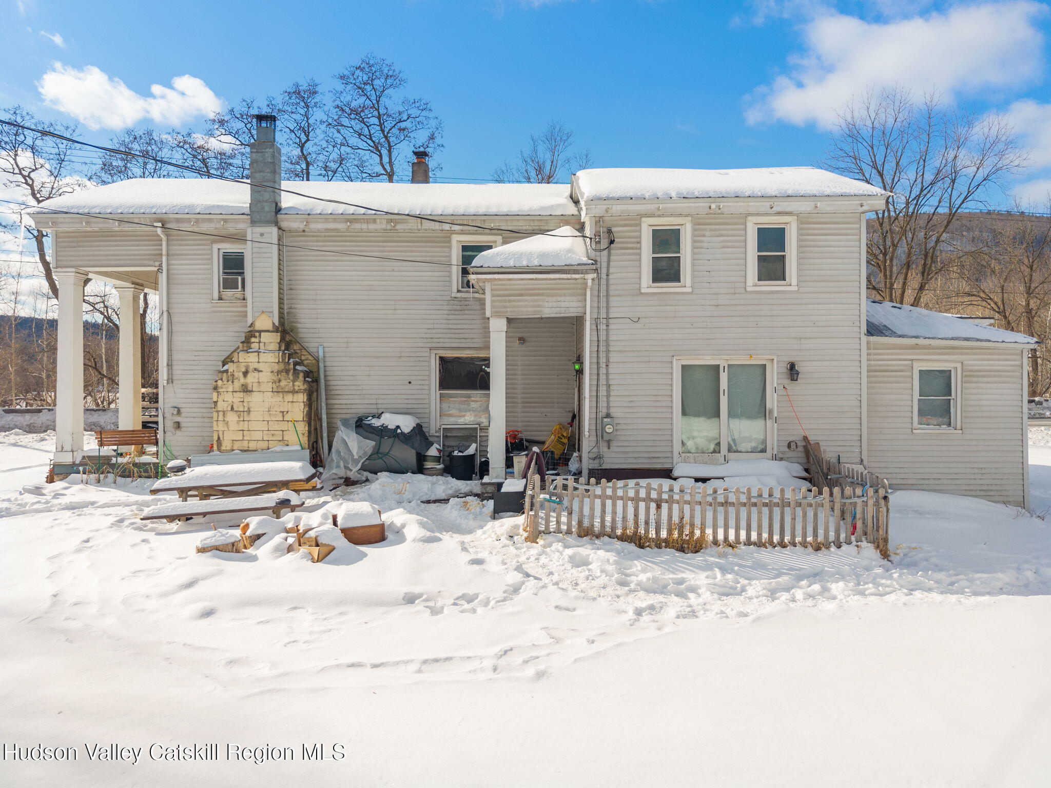 103 Middlefort Road Middleburgh, NY 12122 - Photo 4 of 14 a front view of a house with a fence