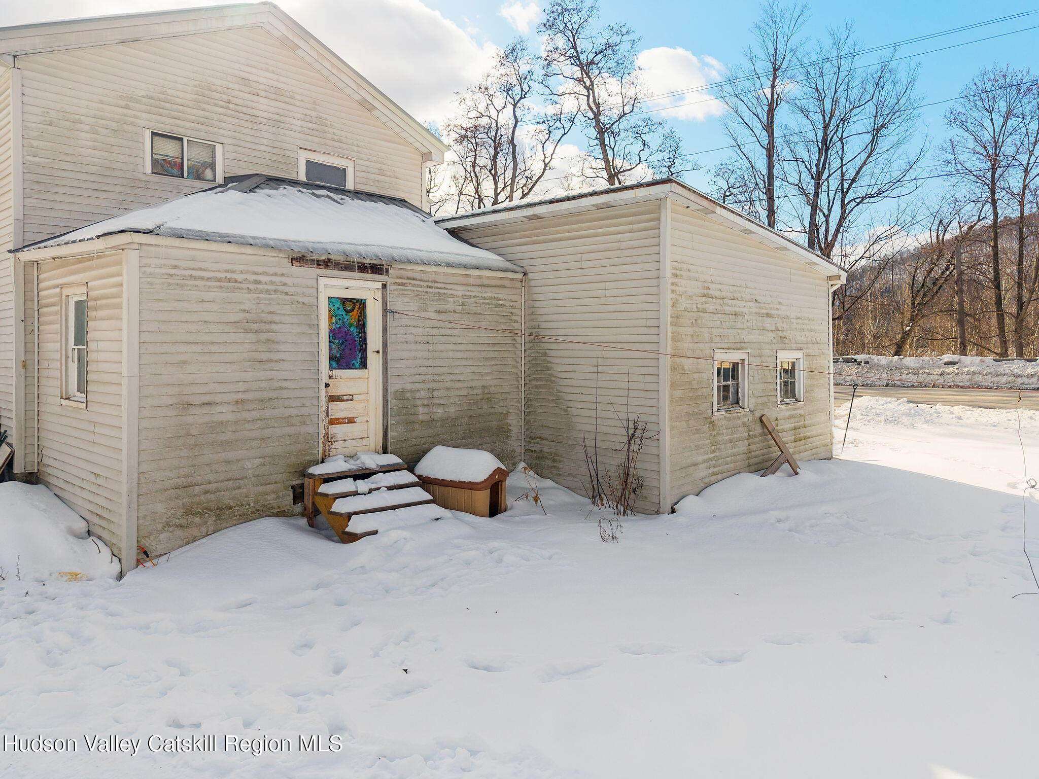 103 Middlefort Road Middleburgh, NY 12122 - Photo 6 of 14 a view of a house with a yard
