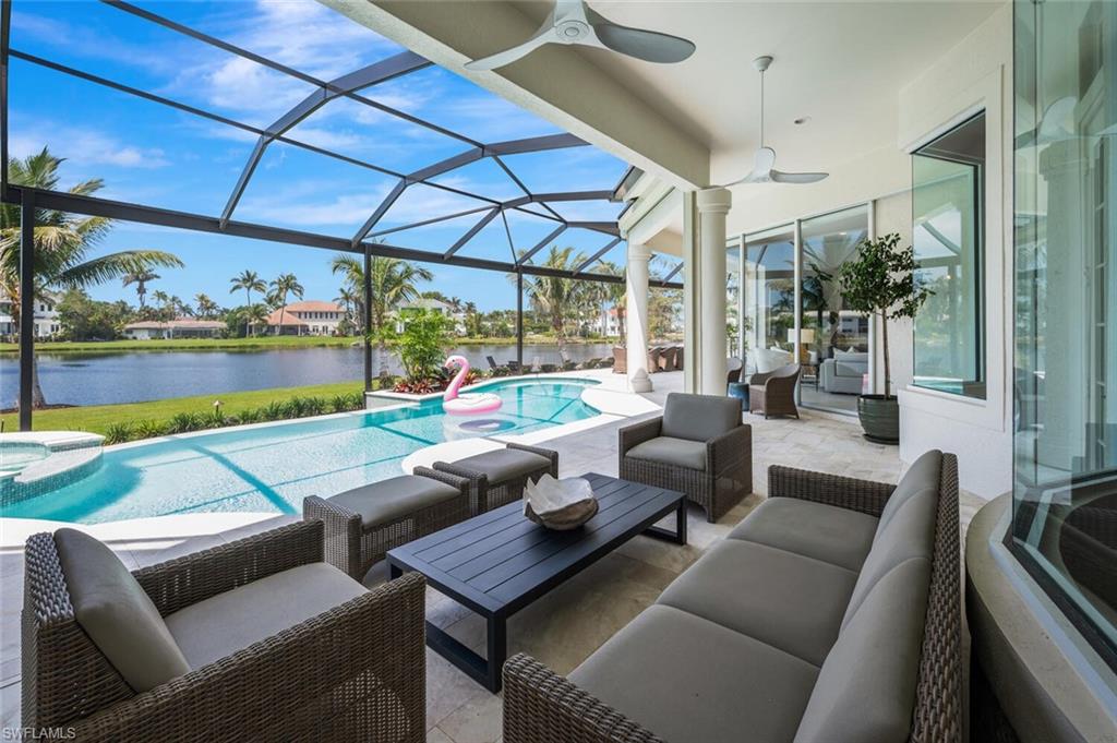 4129 Willowhead Way Naples, FL 34103 - Photo 44 of 50 a outdoor living space with patio furniture