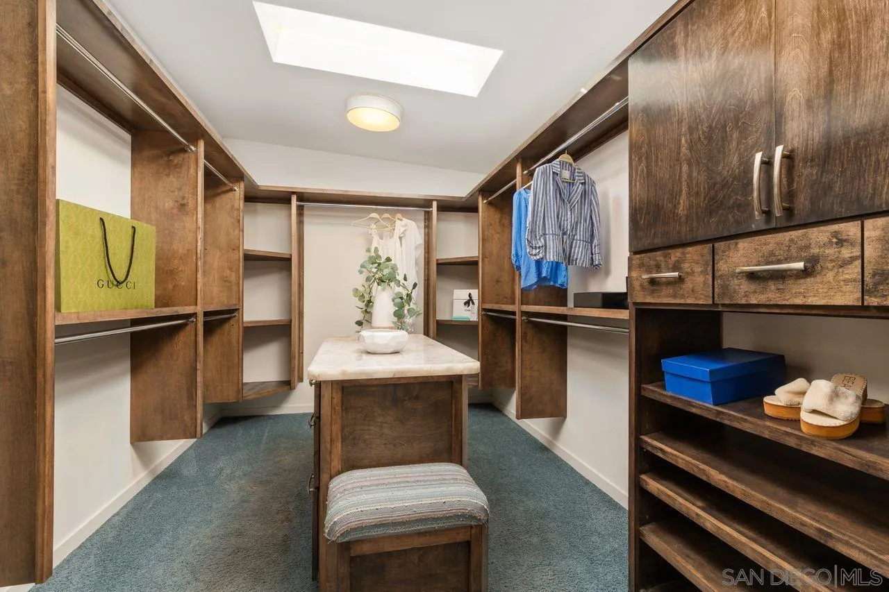 4465 Adams Street Carlsbad, CA 92008 - Photo 32 of 59 a kitchen with stainless steel appliances granite countertop a refrigerator and a stove