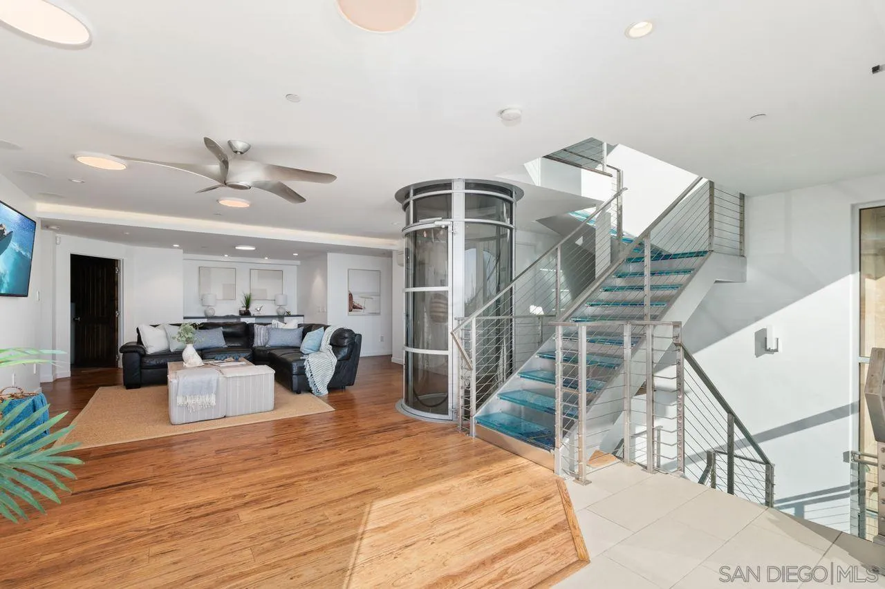 4465 Adams Street Carlsbad, CA 92008 - Photo 33 of 59 a living room with furniture and white walls