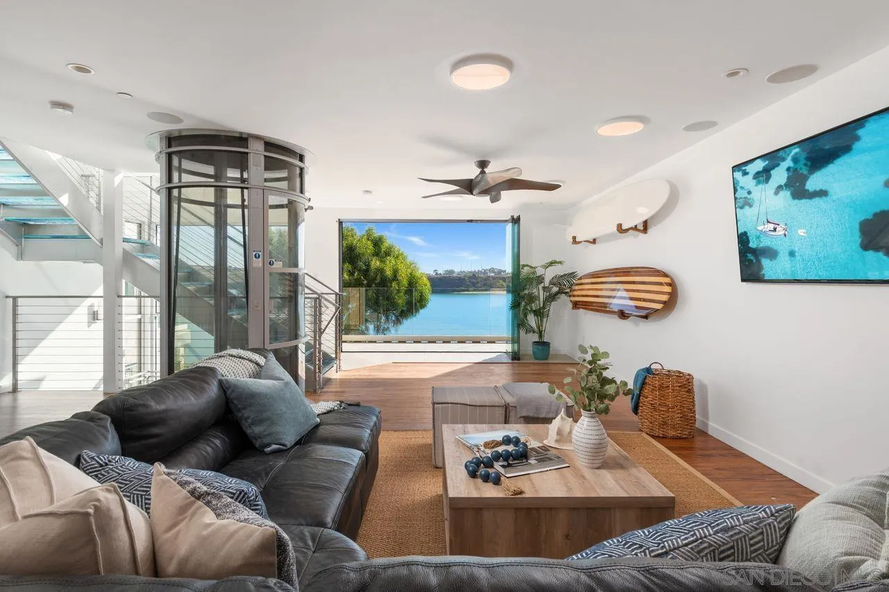4465 Adams Street Carlsbad, CA 92008 - Photo 34 of 59 a living room with furniture and a large window