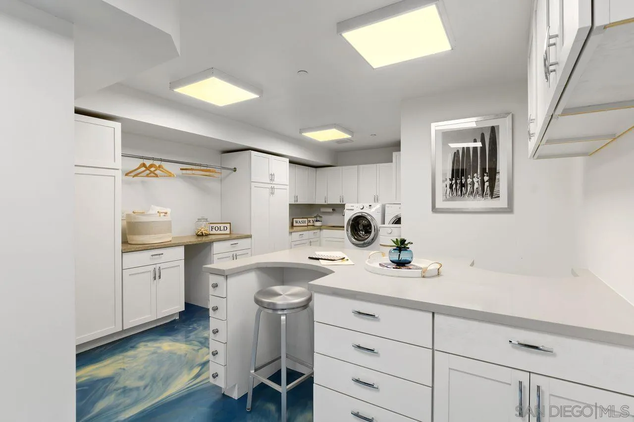 4465 Adams Street Carlsbad, CA 92008 - Photo 39 of 59 a kitchen with a sink cabinets and window