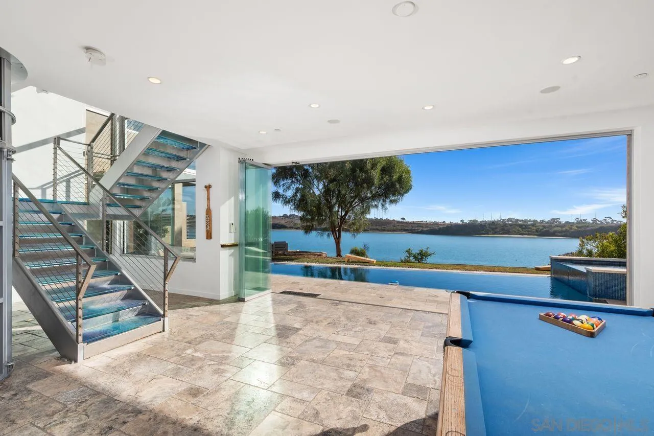 4465 Adams Street Carlsbad, CA 92008 - Photo 43 of 59 a view of a living room and a flat screen tv