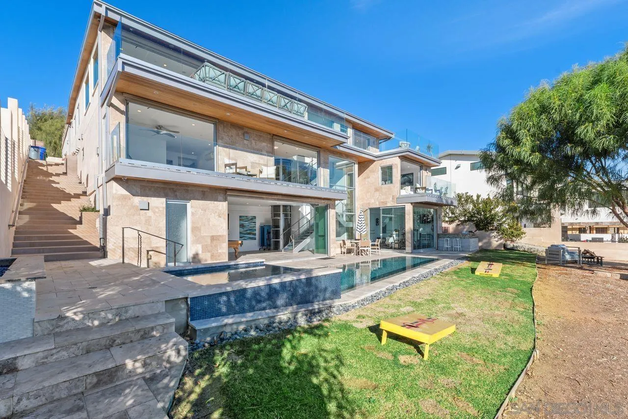 4465 Adams Street Carlsbad, CA 92008 - Photo 49 of 59 a view of a house with pool and chairs