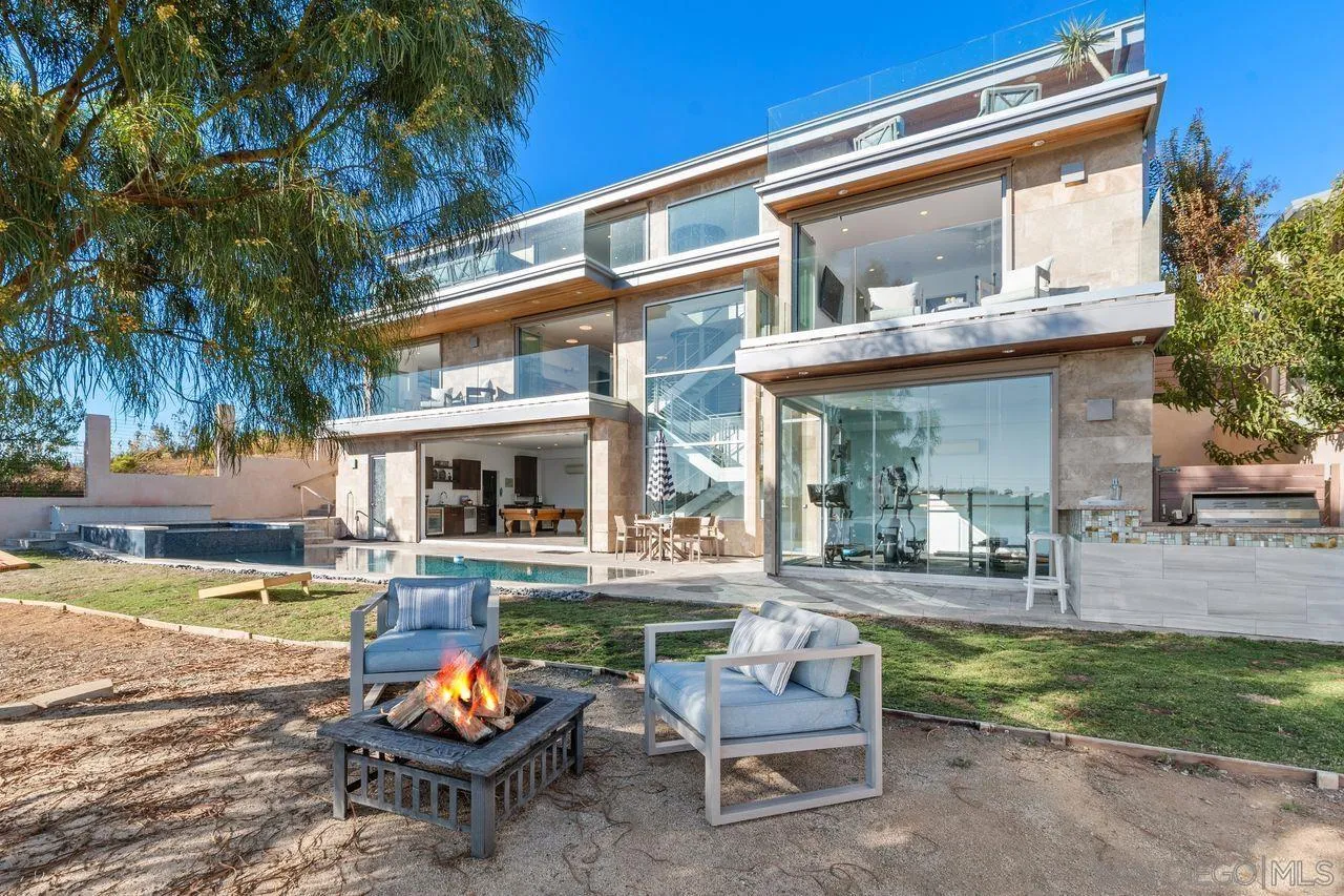 4465 Adams Street Carlsbad, CA 92008 - Photo 50 of 59 a view of a house with swimming pool and sitting area