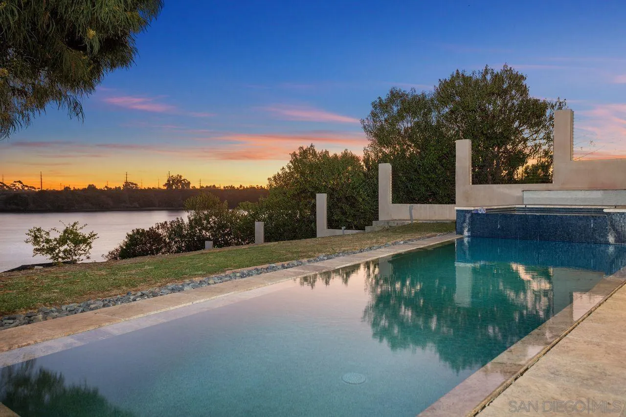 4465 Adams Street Carlsbad, CA 92008 - Photo 8 of 59 a view of a lake with a big yard
