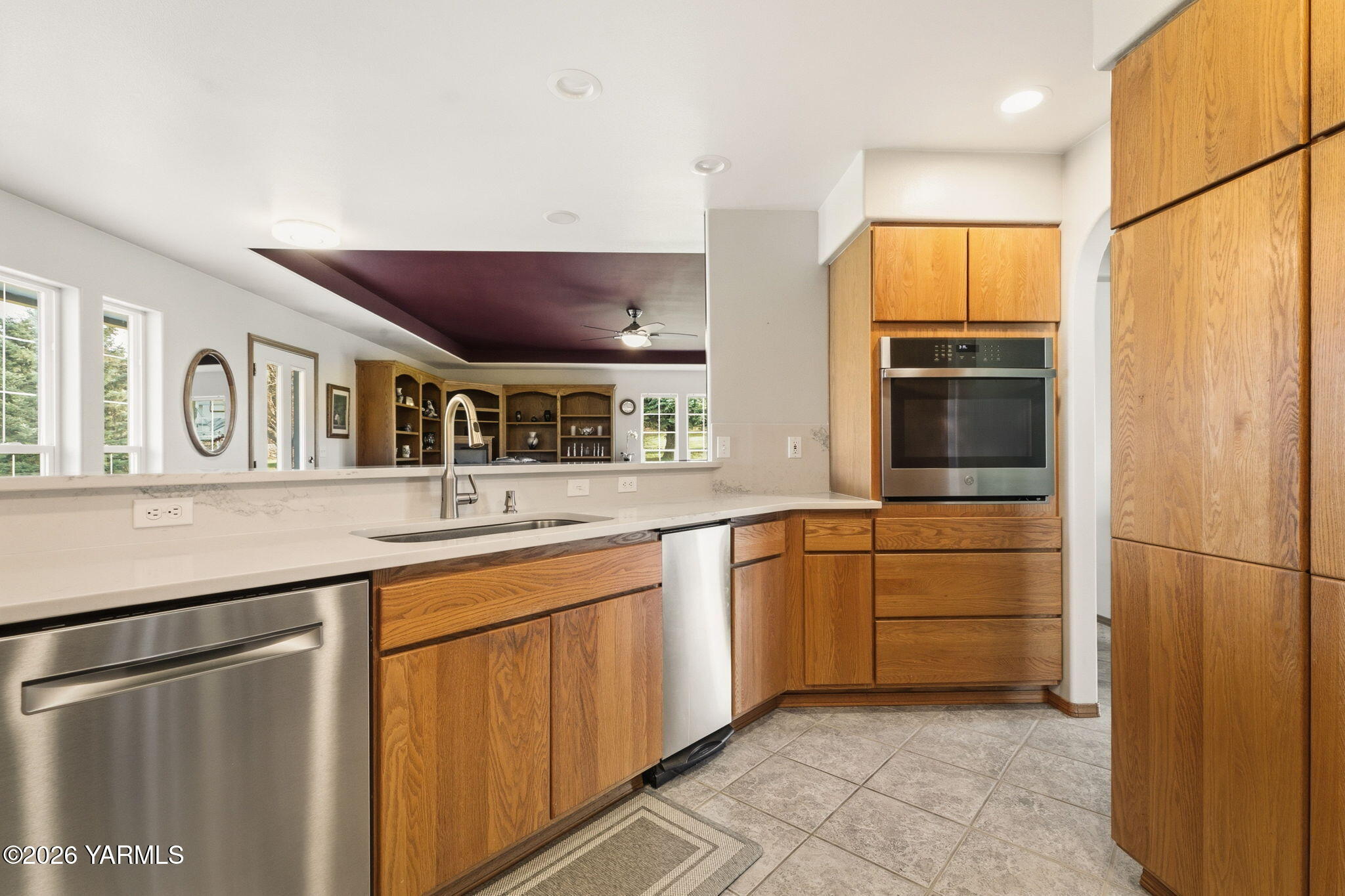 461 White Road Yakima, WA 98901 - Photo 23 of 36 a kitchen with stainless steel appliances granite countertop a refrigerator and a sink