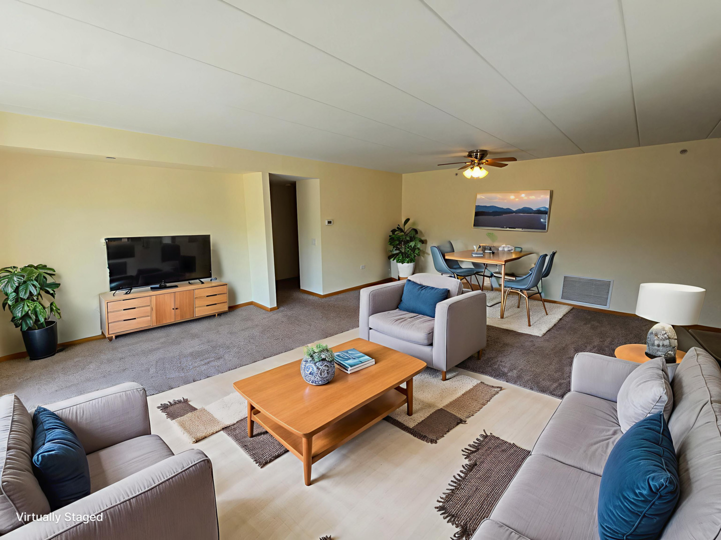 6860 Winding Trail, Unit 204 Oak Forest, IL 60452 - Photo 2 of 14 a living room with furniture and a flat screen tv