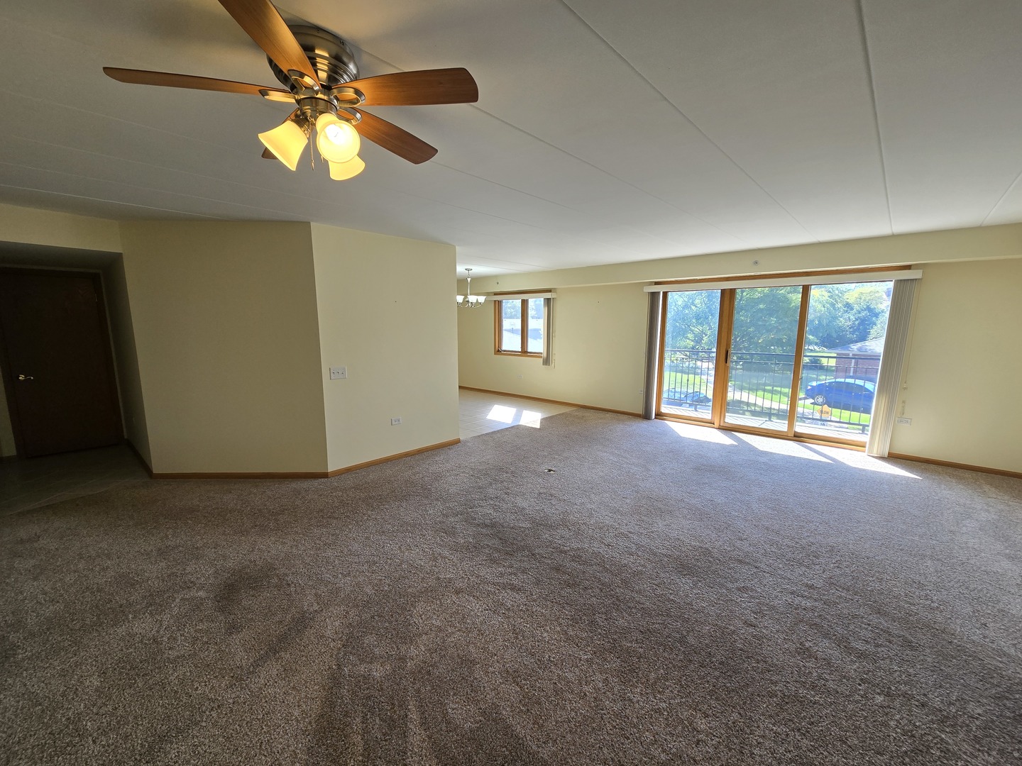 6860 Winding Trail, Unit 204 Oak Forest, IL 60452 - Photo 4 of 14 a view of an empty room with a window