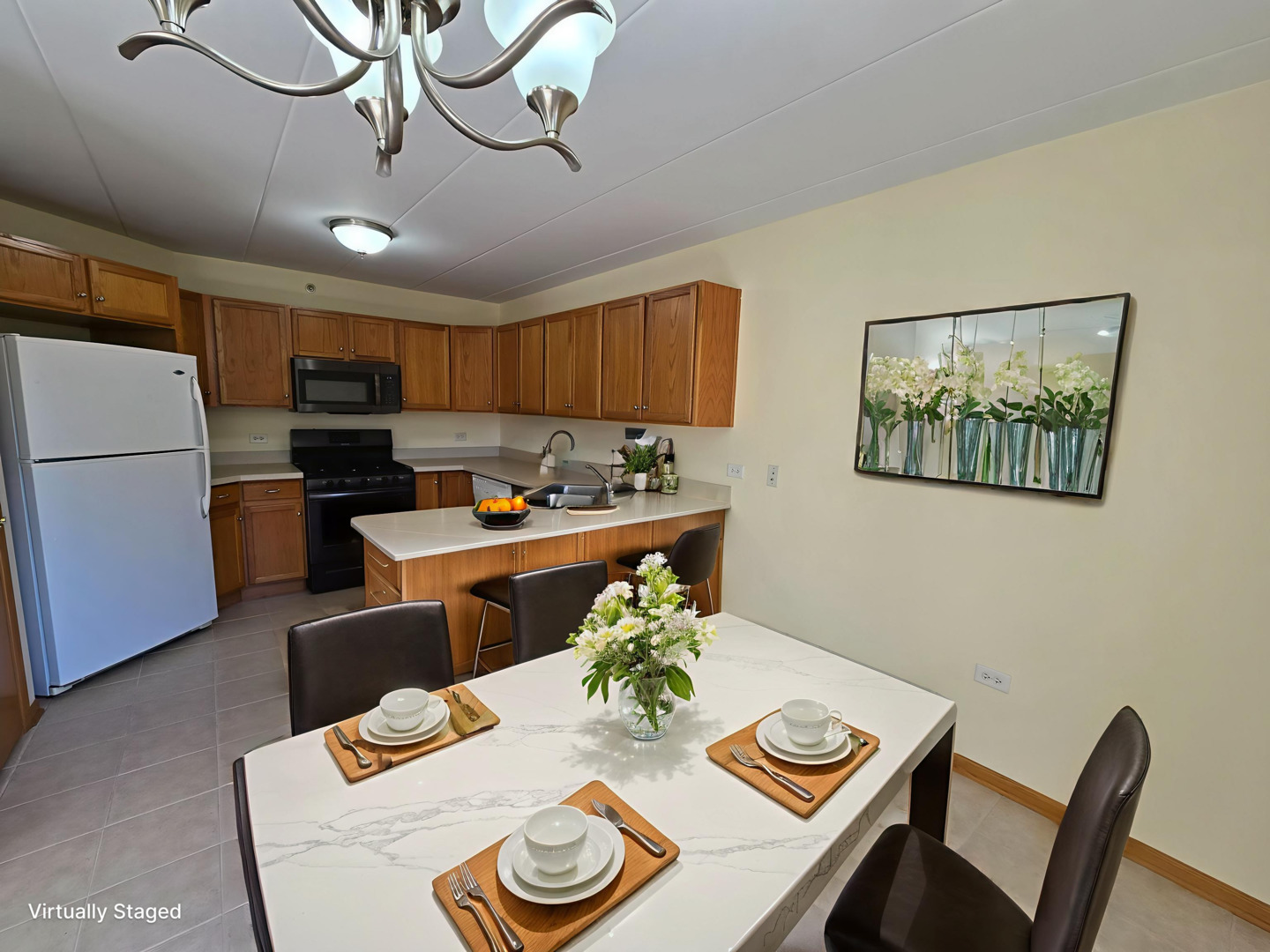 6860 Winding Trail, Unit 204 Oak Forest, IL 60452 - Photo 5 of 14 a kitchen with a dining table and chairs