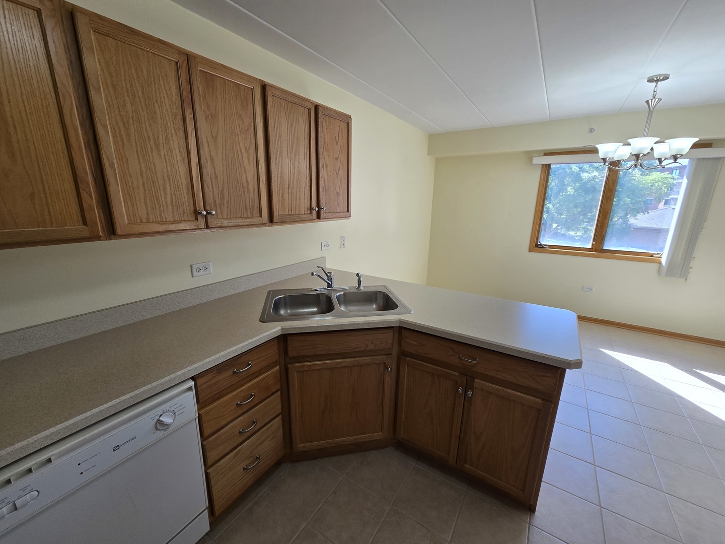 6860 Winding Trail, Unit 204 Oak Forest, IL 60452 - Photo 7 of 14 a kitchen with a sink and cabinets
