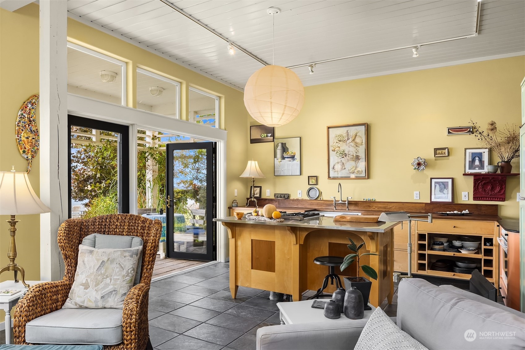 6346 South Bay Road Freeland, WA 98249 - Photo 17 of 40 a kitchen with stainless steel appliances granite countertop a stove and cabinets